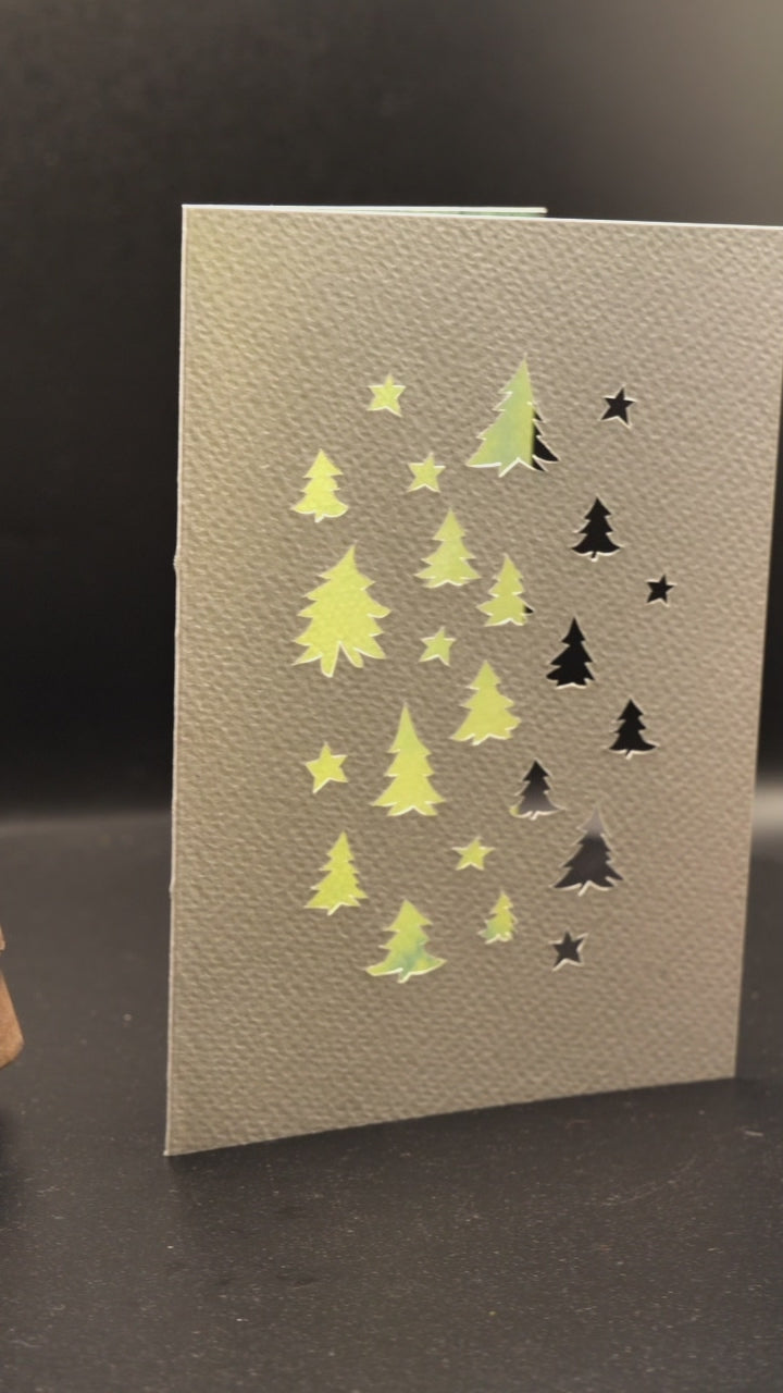 Modèle de Papercut spécial Noël - forêt de sapins